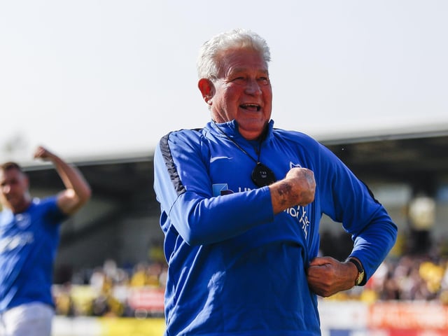Portsmouth kit assistant Barry Harris celebrates.