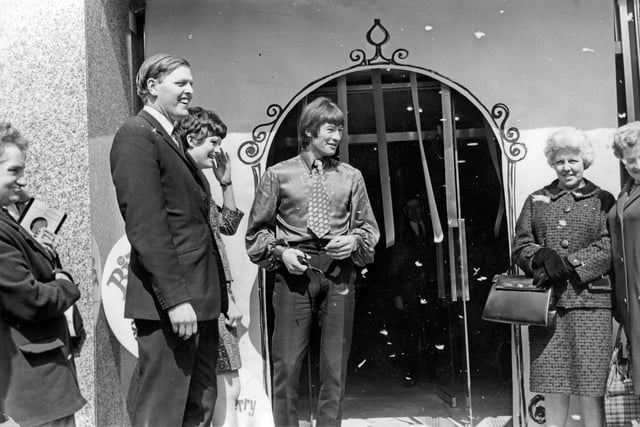 Sheffield singer Dave Berry opens Cockayne's department store Birdcage Boutique amidst feathers from a flock of pigeons that were released, 1967