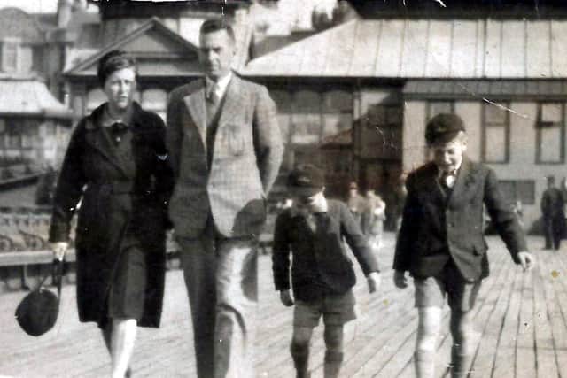 Graham and his family at Blackpool Pier. He said: "Even in wartime Mum and Dad made sure we had an annual holiday.   
"We did, in fact, have relatives who lived in Blackpool, but we didn't stay with them, we booked "Accommodation", which took the form of a boarding house, where we had bedrooms, but we provided all the food, and the landlady cooked it for us.   
"During the year, in preparation for our holiday, Mum would secrete various special items, like tins of peaches (very rare) and before we set off she would post a parcel of goodies to the boarding house address, and it was there waiting for us when we arrived.   Those holidays were very special for us!"
