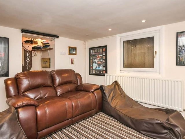 Film buffs will be in their element in the property's cinema room, which can be found on the lower ground floor. It's an ideal place to gather friends and family to watch movies on the projector.