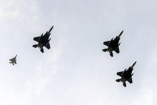 F-15s seen from Endcliffe Park in Sheffield, as warplanes from Britain and the United States stage a flypast Danny Lawson/PA Wire