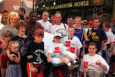 Bomber Graham and Glyn Rhodes prepare to set off on a charity walk to Castleton from the Hallamshire House pub, Commonside, with locals from the Hallamshire House, The Office pub and members of the Sheffield Boxing Club, July 20 1997