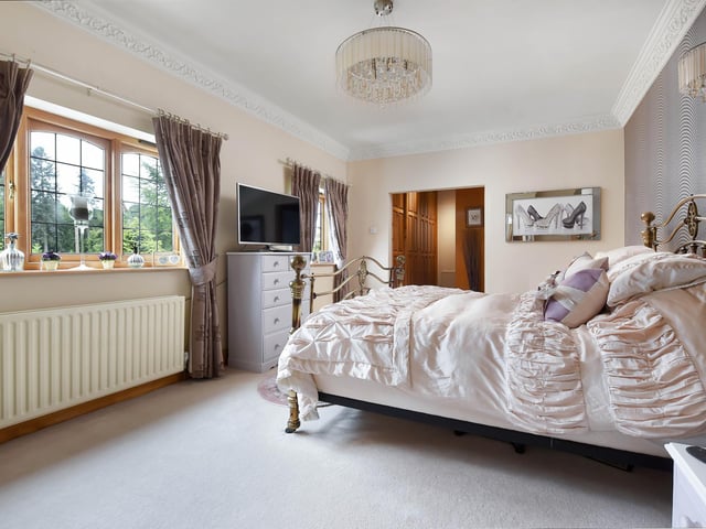 The master bedroom has a dressing room and en-suite.