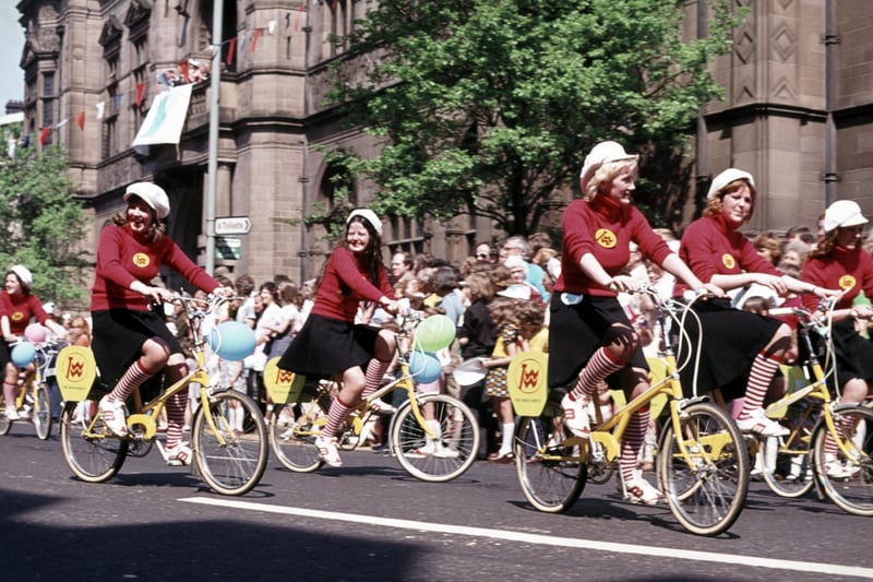 The Sheffield Spectacular, a parade outside the Town Hall, on Pinstone Street, in the city centre, featuring the Thomas W Ward cyclists, dated 1975-6.