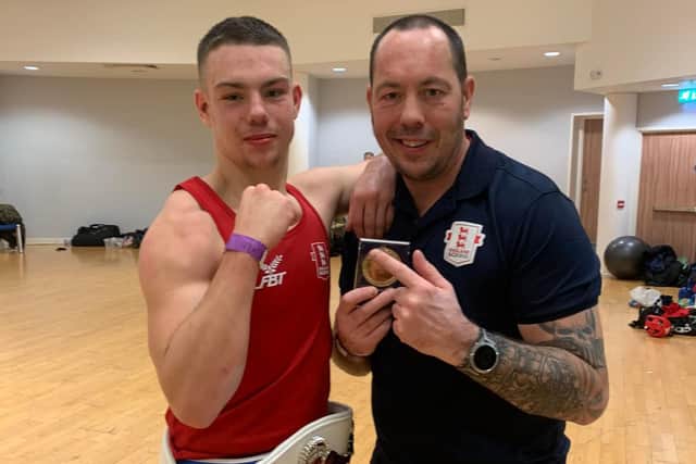 Darren Littlewood Jnr pictured with his dad after following in his father's footsteps.