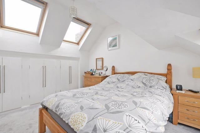 This spacious master bedroom is located on the attic floor and has plenty of space for lots of additional bedroom furniture if needed.