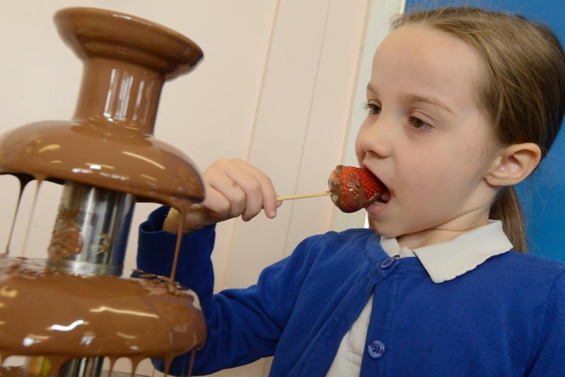 Six-year-old Elyssa Allen couldn't resist the chocolate fountain at the Eskdale Academy Fairtrade Coffee Morning in 2016.