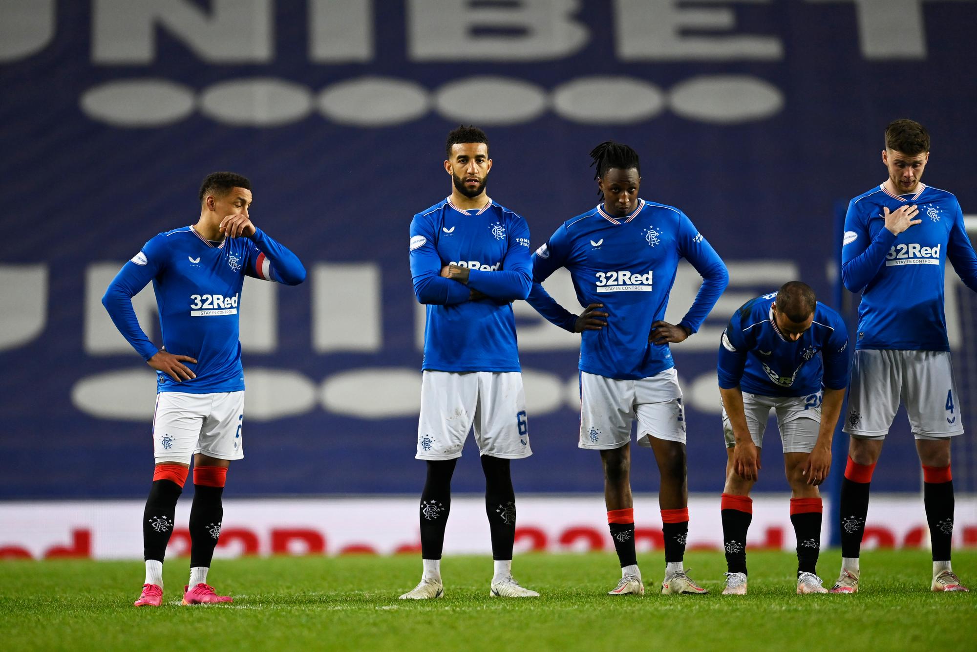 Rangers players look on as St Johnstone win the penalty shoot-out. (Photo by Rob Casey / SNS Group)