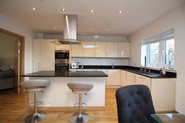 This spacious open plan kitchen/dining room area is fully kitted out, and immaculately finished. Featuring an island unit with electric oven and gas hob plus an extractor unit, quartz work tops, and integrated dishwasher and fridge/freezer.