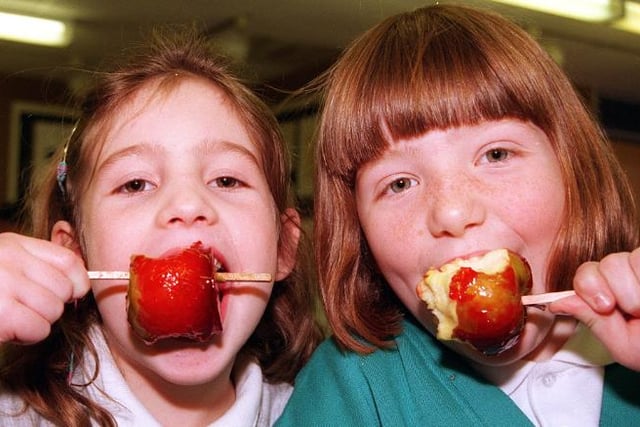 Jessica Boulton and Rachel Nicole both aged seven at Copley Road School in Sprotbrough in 1998. Enjoying toffee apples.