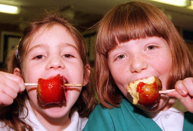 Jessica Boulton and Rachel Nicole both aged seven at Copley Road School in Sprotbrough in 1998. Enjoying toffee apples.
