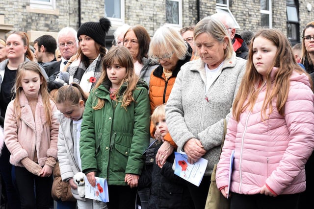 Families stopped to remember the fallen during the two-minute silence.