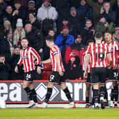 Sheffield United's Daniel Jebbison celebrates with his teammates after scoring against Hull: Danny Lawson/PA Wire.