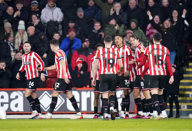 Sheffield United's Daniel Jebbison celebrates with his teammates after scoring against Hull: Danny Lawson/PA Wire.