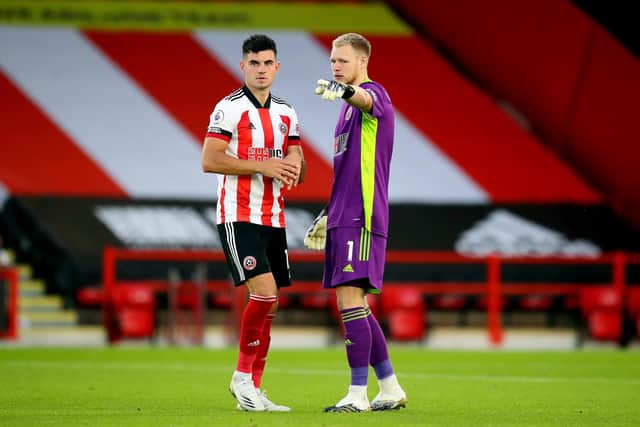 John  Egan is back in the Sheffield United  line-up to face Arsenal after serving a one-match suspension. Simon Bellis/Sportimage