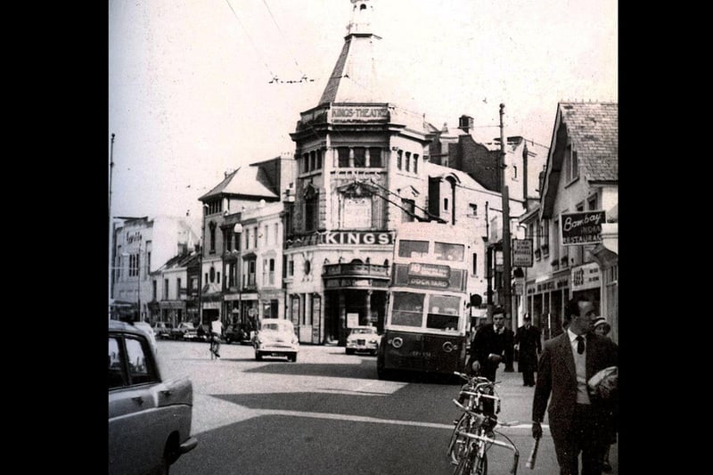 Taken in 1963. The Kings theatre has now been built on the junction with Exmouth Road and the day of the cycle seems well to the fore with so many parked against the kerb.
A police constable is walking towards the photographer perhaps to the police station located just behind the photographer.
Further up the road can be seen the Essoldo cinema.