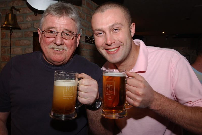 Enjoying a pint from their new glass tankards at the Colonel Prior pub were Rob Bell, left, and Peter Dodds 14 years ago.