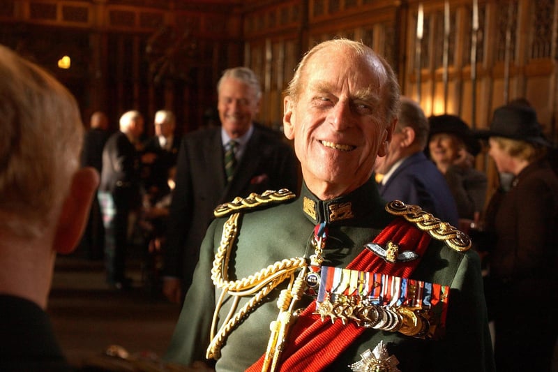 The Duke of Edinburgh smiles as he mingles with former members of the Queen's Own Highlanders in the Great Hall of Edinburgh Castle, Tuesday November 25, 2003.