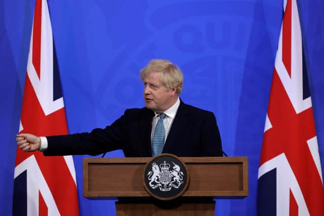 Britain's Prime Minister Boris Johnson gives an update on the coronavirus Covid-19 pandemic . (Photo by Matt Dunham / POOL / AFP) (Photo by MATT DUNHAM/POOL/AFP via Getty Images)