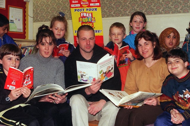 Parents at Anne Grove Primary School Heeley , Sharon Batty, Andy Coish And Androula Philippou read to some of the pupils  at the school on World Book Day in 1999