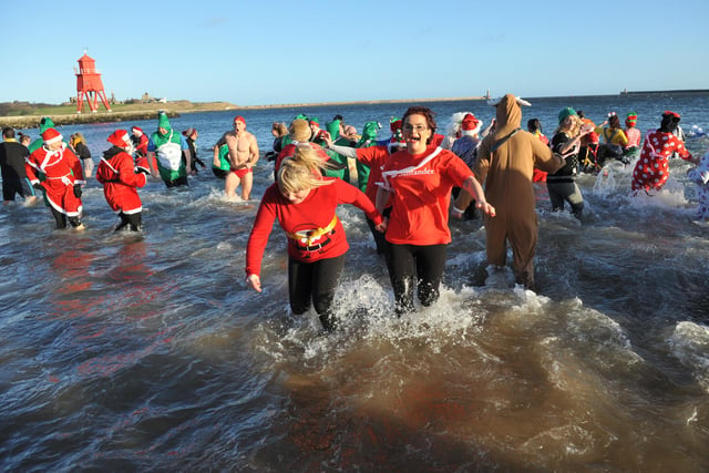 Boxing Day dippers brave the icy cold waters of Little Haven in the 2016 Boxing Day dip. Were you there?