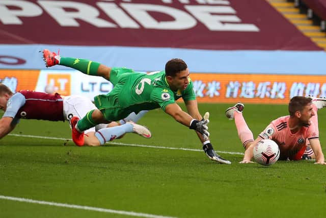 Chris Basham of Sheffield Utd (R) is fouled by Matt Targett of Aston Villa (L) leading to a penalty: Simon Bellis/Sportimage