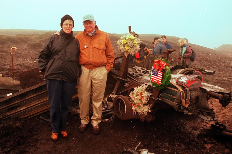 Pictured at the Snake Pass summit are the daughter of B29 bomber flight captain Jean Tanner Gray with her husband Don Gray after laying wreaths at the site following a two-hour hike through bog in terrible conditions