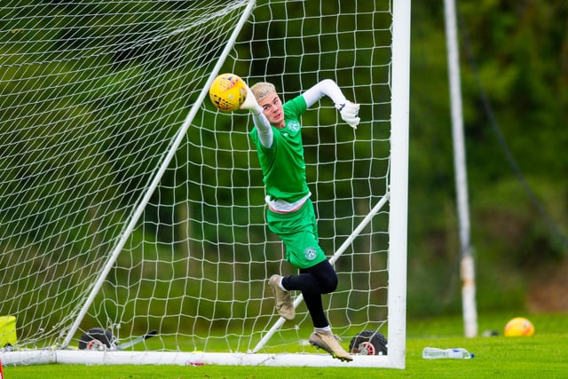 Teenage 'keeper Murray Johnson makes a save during a training session