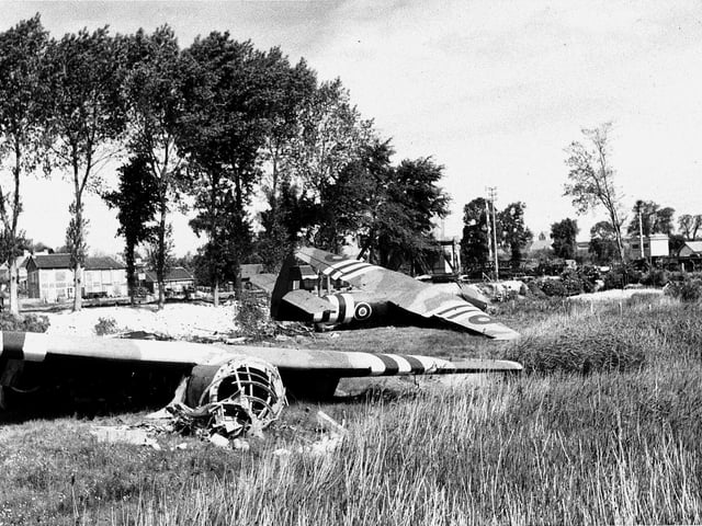 Airspeed Horsa gliders lay in the fields where they landed at midnight 6/6/1944 prior to the attack to capture the soon to be famous Pegasus bridge over the Caen canal. Through the trees on the left can be seen the Gondree Cafe, the owners of which were the first French citizens to be liberated by the British Army.
IWM pic B5233