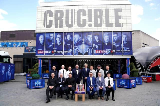 Players outside The Crucible in Sheffield ahead of this year's World Snooker Championship. World Snooker Tour president Barry Hearn wants to knock down the exisiting building and replace it with a new 3,000-seat venue to keep the tournament in the city for another year (pic: Zac Goodwin/PA Wire)