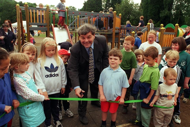 Sheffield Council Chair of Leisure Services Coun Andrew Milton cuts the tape to open a new play area at Millhouses Park in 1999