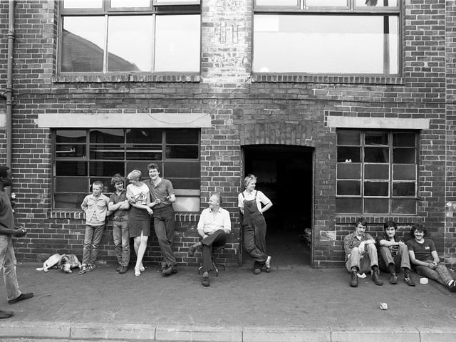 Cutlery workers take a break, Sydney Street, Sheffield, July 19, 1983