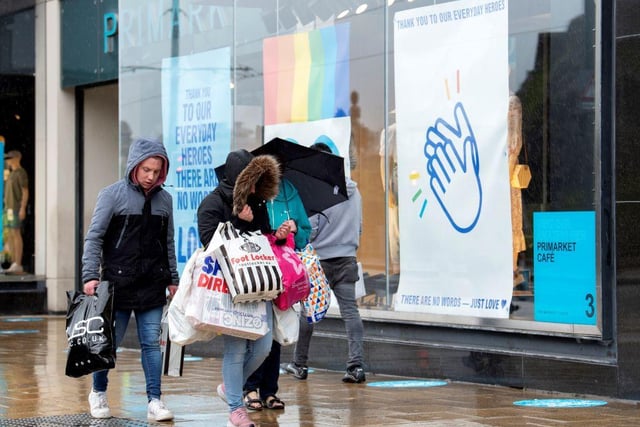 Hundreds of people were seen clutching bags of shopping in the capital as shops reopened