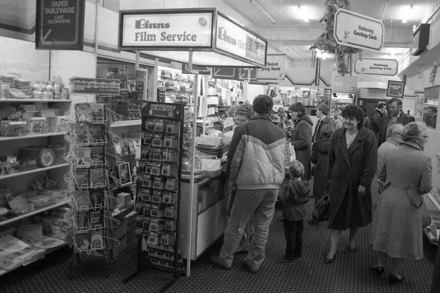 There is plenty of interest in the film service counter at Binns in this 1980 shot. Did you like to visit this section of the department store?