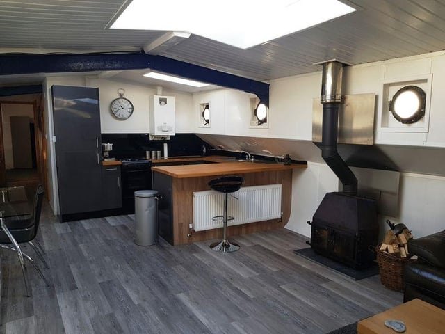 This three-bed houseboat in Bursledon is on the market for £169,950.