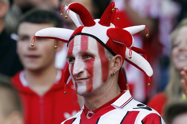 A Sheffield United supporters at the FA Cup Semi-final match between Hull City and the Blades at Wembley Stadium. April 2014.  AFP PHOTO/IAN KINGTON