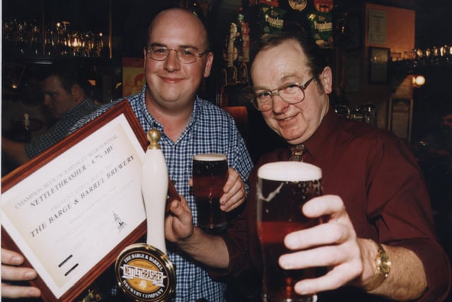 Elland Brewer John Eastwood (right) receives the champion beer of Barnsley Beer Festival certificate organiser and Barnsley CAMRA member, DAvid Hollingsworth, at a  celebration party held by White Rose Inn in 2000