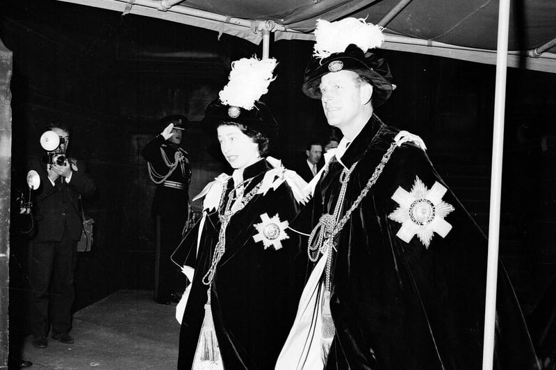 Queen Elizabeth and Prince Philip Duke of Edinburgh in their robes when King Olav of Norway was made a Knight of the Thistle at St Giles cathedral Edinburgh during his state visit to Scotland in October 1962.