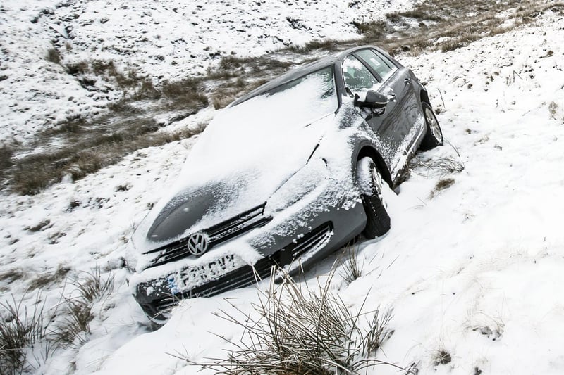 An abandoned car on the roadside on the Snake Pass as heavy snowfall across parts of the UK caused widespread disruption in December 10, 2017