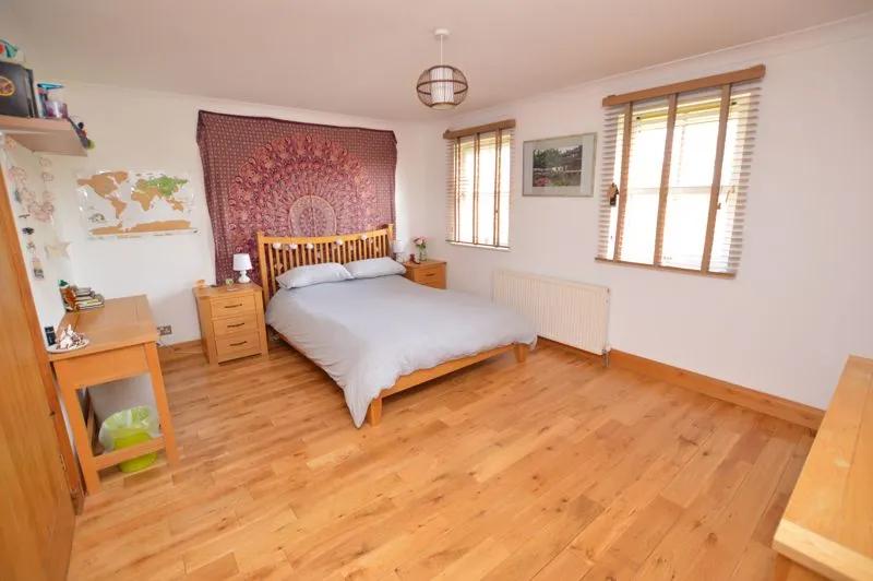 There are five additional bedrooms, including a large  ‘attic style’ bedroom with ensuite above the garden room.