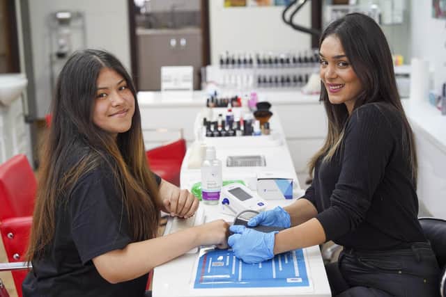 They’re not just helping you take a bit off your fringe. When you get your hair done at two well known Sheffield business, they’ll also help you take a bit off your blood pressure. Blood prssure checks at Lux Beauty Salon. L-R Anais and Racha. Picture Scott Merrylees