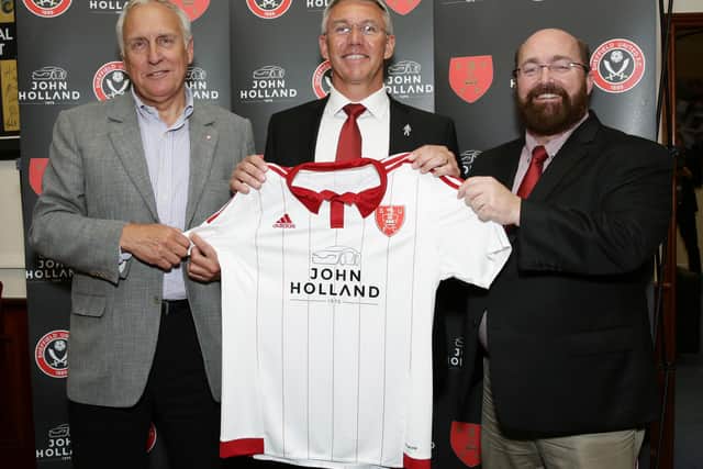 Nigel Adkins (centre) with co-chairmen Jim Phipps (right) and Kevin McCabe, during his unveiling as the new manager of Sheffield United in 2015.