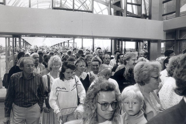 Crowds throng to be among the first to take a look on the Meadowhall shopping centre opening day on September 4, 1990