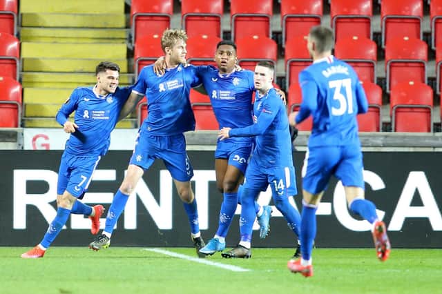 Rangers' Swedish defender Filip Helander (2nd L) celebrates scoring with his team-mates during the UEFA Europa League, last 16, first Leg football match Slavia Prague v Rangers at the Eden Arena stadium in Prague, Czech Republic, on March 11, 2021. (Photo by Milan Kammermayer / AFP) (Photo by MILAN KAMMERMAYER/AFP via Getty Images)