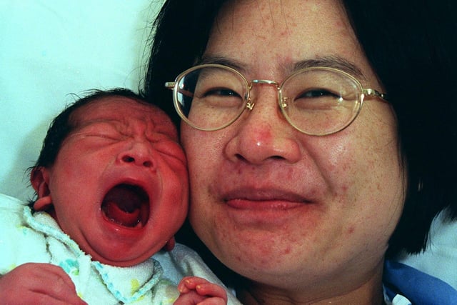 Pictured at Jessops Hospital, Sheffield, where Ru-Miao Hwang  from Bannerdale, Sheffield, is seen with her baby Isaac Hsu, born at 6.15 am on New Year's Day 1999 weighing 8lbs  3oz.