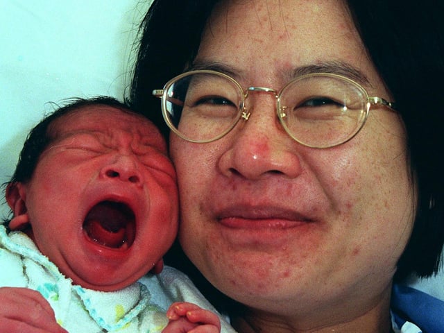 Pictured at Jessops Hospital, Sheffield, where Ru-Miao Hwang from Bannerdale, Sheffield, is seen with her baby Isaac Hsu, born at 6.15 am on New Year's Day 1999 weighing 8lbs 3oz.