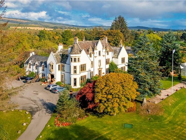 A stunning baronial styled former mansion house set in 10 acres of land - £1,800,000.
