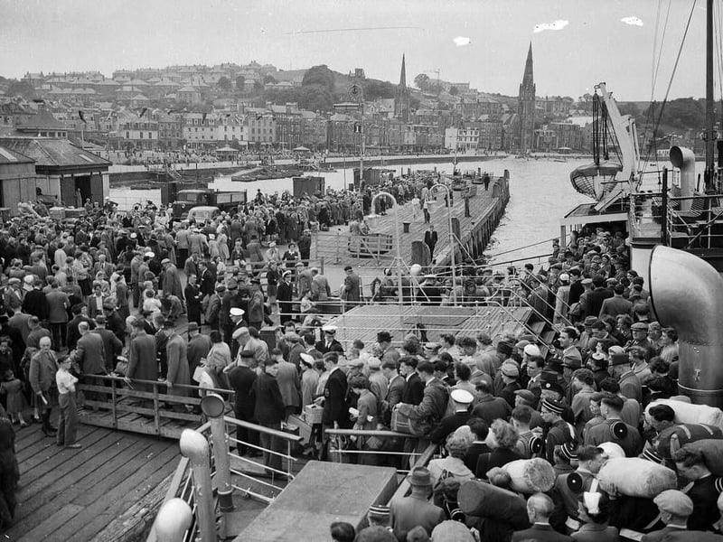 Crowds of holidaymakers coming ashore at Rothesay pier on July 17 1956 for the Glasgow Fair holiday.