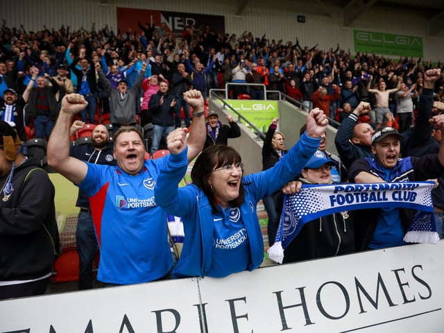 Pompey fans celebrate at full-time following the Blues' 2-1 win at Doncaster Rovers in October.