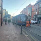 Trams have been suspended this morning in part of Sheffield city centre. Picture shows the broken down tram on West Street